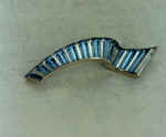 Brooch "Sound of surf". 1988. Nickel, perunit, mountain crystal.