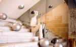 Interior sculpture "Music of silver spheres". 1998. Gypsum, wood, concrete.